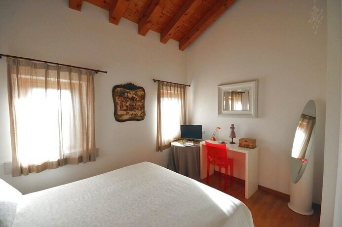 Imagen de la habitación del Hotel Country House Due Fiumi. Foto 17