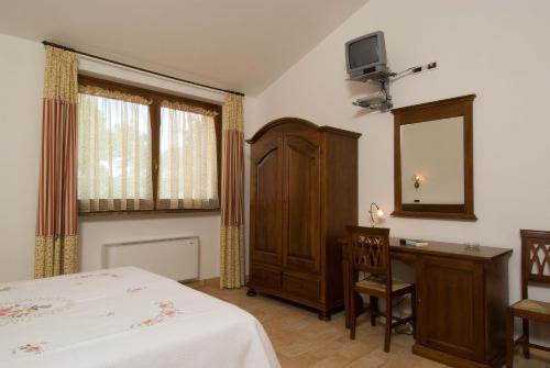 Imagen de la habitación del Hotel Country House La Madonnina. Foto 7