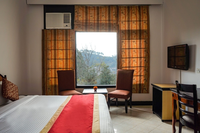 Imagen de la habitación del Hotel Country Inn, Bhimtal. Foto 3