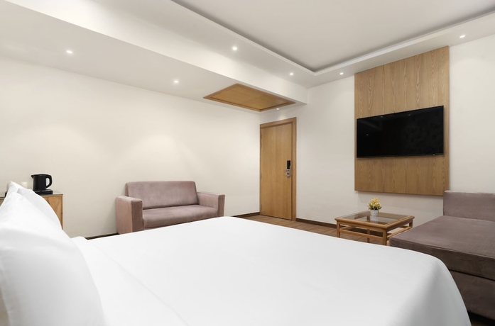 Imagen de la habitación del Hotel Country Inn Katra. Foto 3