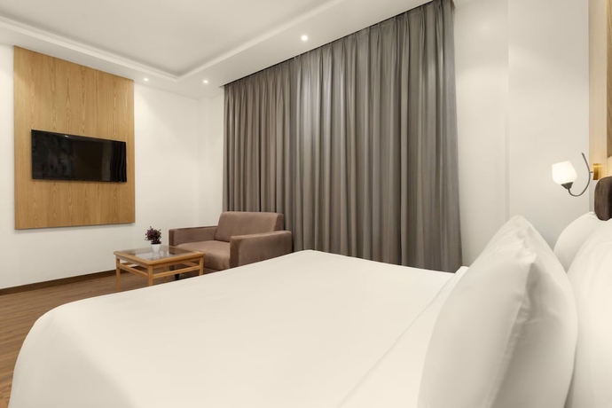 Imagen de la habitación del Hotel Country Inn Katra. Foto 5