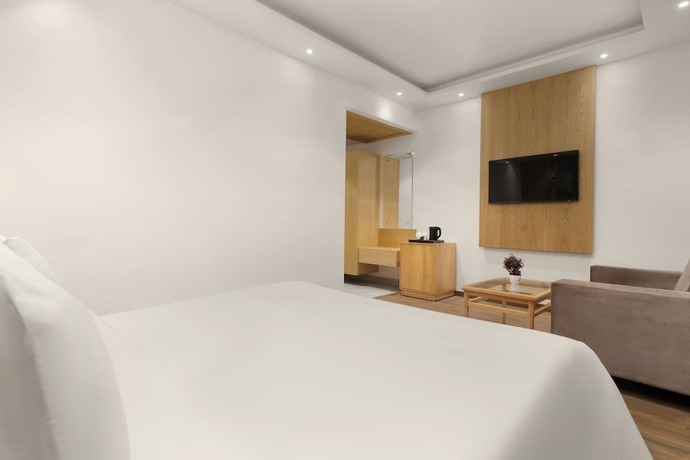 Imagen de la habitación del Hotel Country Inn Katra. Foto 6