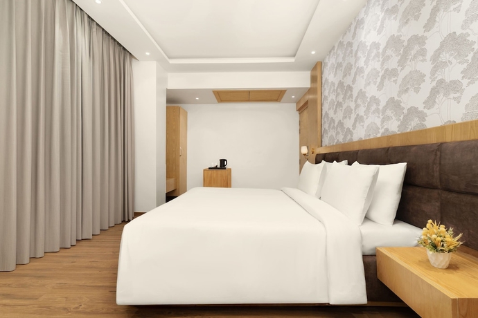 Imagen de la habitación del Hotel Country Inn Katra. Foto 7