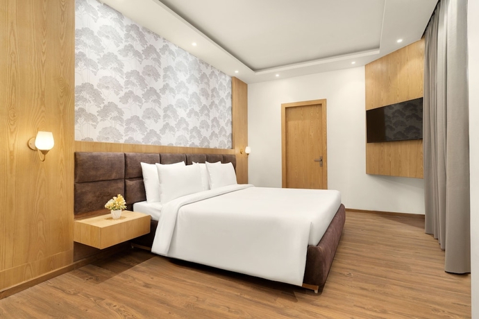Imagen de la habitación del Hotel Country Inn Katra. Foto 8
