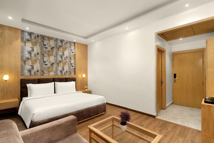 Imagen de la habitación del Hotel Country Inn Katra. Foto 10