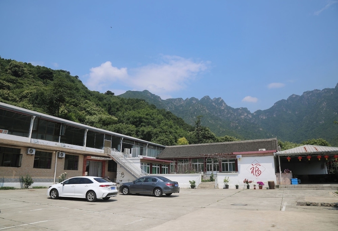 Imagen del bar/restaurante del Hotel Country Inn Mutianyu Jiankou Great Wall. Foto 2