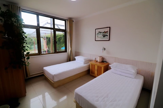 Imagen de la habitación del Hotel Country Inn Mutianyu Jiankou Great Wall. Foto 10