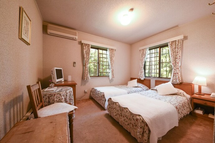 Imagen de la habitación del Hotel Country Inn Orchard House. Foto 21
