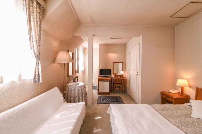 Imagen de la habitación del Hotel Country Inn Orchard House. Foto 26
