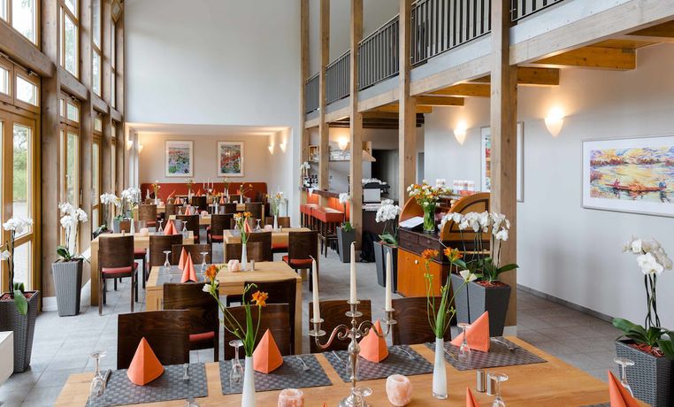 Imagen del bar/restaurante del Hotel Country Inn Ph&ouml;ben. Foto 3