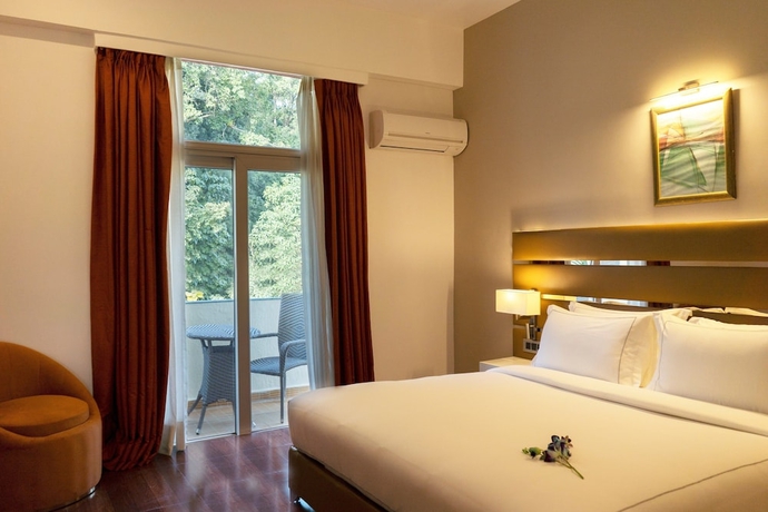 Imagen de la habitación del Hotel Country Inn Tarika Resort Jim Corbett. Foto 4