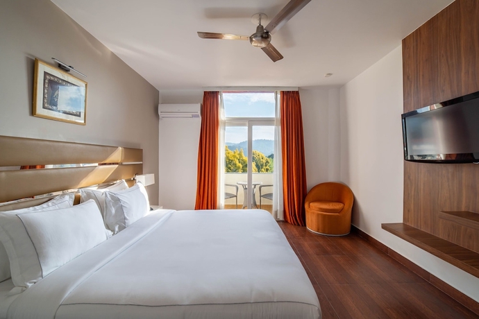 Imagen de la habitación del Hotel Country Inn Tarika Resort Jim Corbett. Foto 5