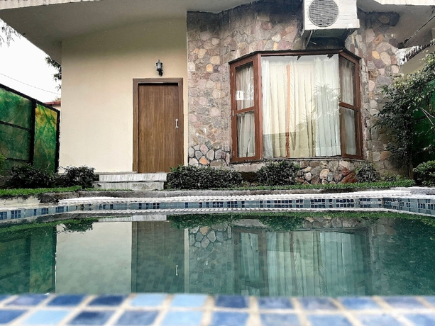 Imagen de la habitación del Hotel Country Inn Tarika Resort Jim Corbett. Foto 6
