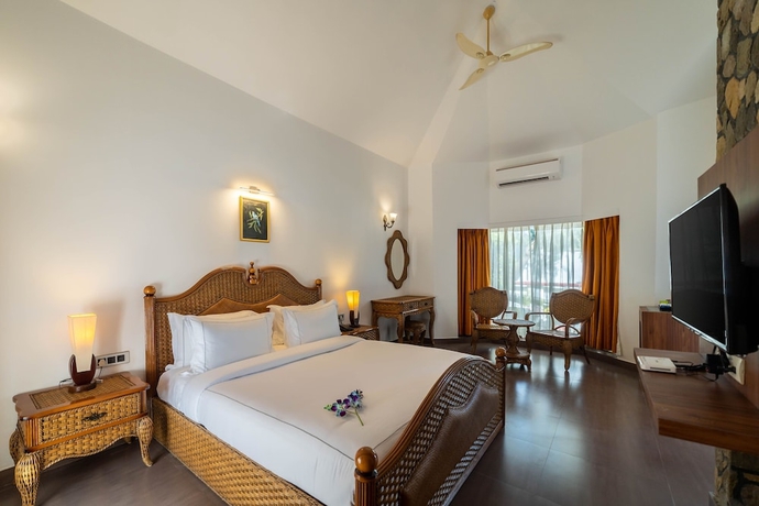 Imagen de la habitación del Hotel Country Inn Tarika Resort Jim Corbett. Foto 7
