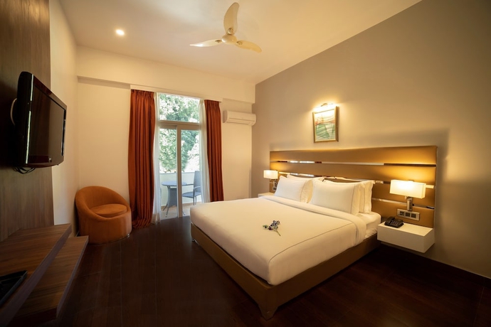 Imagen de la habitación del Hotel Country Inn Tarika Resort Jim Corbett. Foto 8