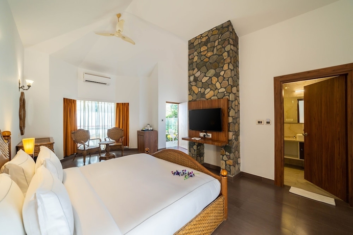 Imagen de la habitación del Hotel Country Inn Tarika Resort Jim Corbett. Foto 9