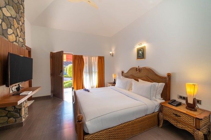 Imagen de la habitación del Hotel Country Inn Tarika Resort Jim Corbett. Foto 11