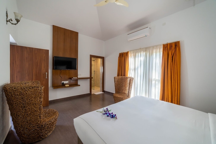 Imagen de la habitación del Hotel Country Inn Tarika Resort Jim Corbett. Foto 13