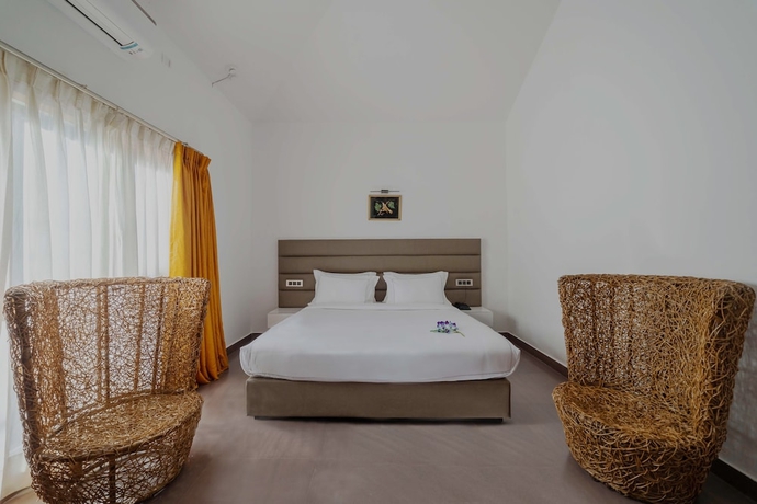 Imagen de la habitación del Hotel Country Inn Tarika Resort Jim Corbett. Foto 15