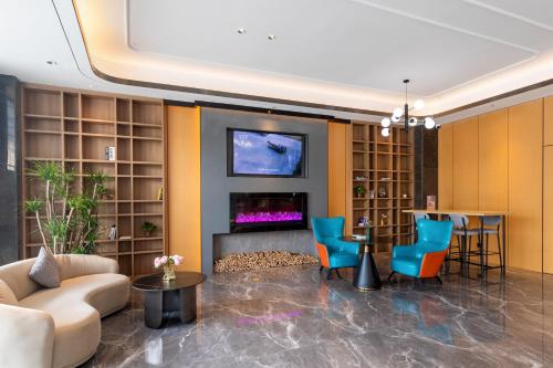 Imagen general del Hotel Country Inn & Suite by Radisson, Guangzhou Huadu Shiling. Foto 4