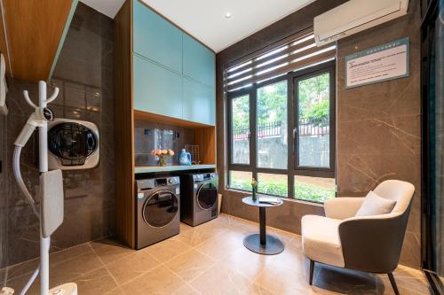 Imagen general del Hotel Country Inn & Suite by Radisson, Guangzhou Huadu Shiling. Foto 5