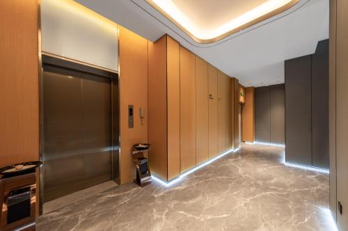 Imagen general del Hotel Country Inn & Suite by Radisson, Guangzhou Huadu Shiling. Foto 10