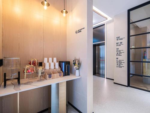 Imagen general del Hotel Country Inn & Suite by Radisson, Guangzhou Railway Station Xiaobei. Foto 1