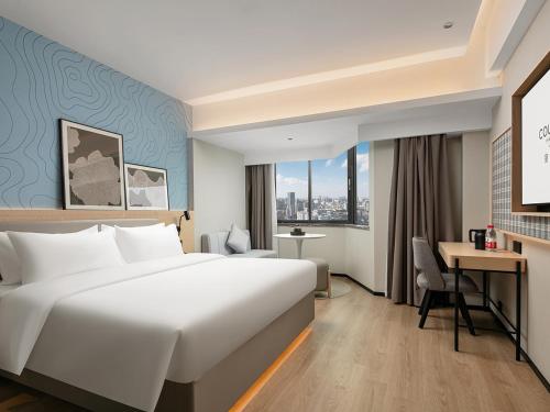 Imagen de la habitación del Hotel Country Inn & Suite by Radisson, Guangzhou Railway Station Xiaobei. Foto 15