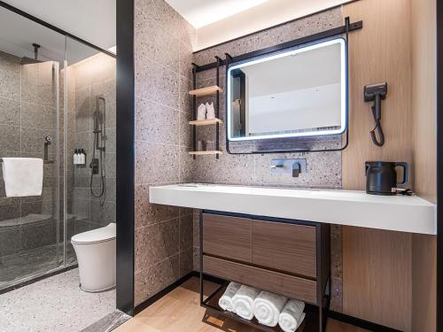 Imagen general del Hotel Country Inn & Suite by Radisson, Guangzhou Railway Station Xiaobei. Foto 6