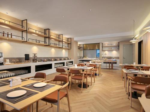 Imagen general del Hotel Country Inn & Suite by Radisson, Guangzhou Railway Station Xiaobei. Foto 9