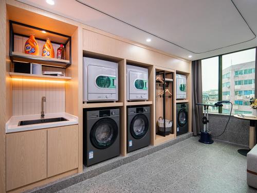 Imagen general del Hotel Country Inn & Suite by Radisson, Guangzhou Railway Station Xiaobei. Foto 11