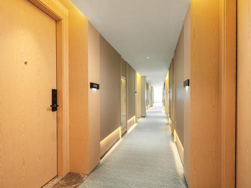 Imagen general del Hotel Country Inn & Suite by Radisson, Guangzhou Railway Station Xiaobei. Foto 12