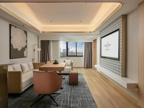 Imagen de la habitación del Hotel Country Inn & Suite by Radisson, Guangzhou Railway Station Xiaobei. Foto 19