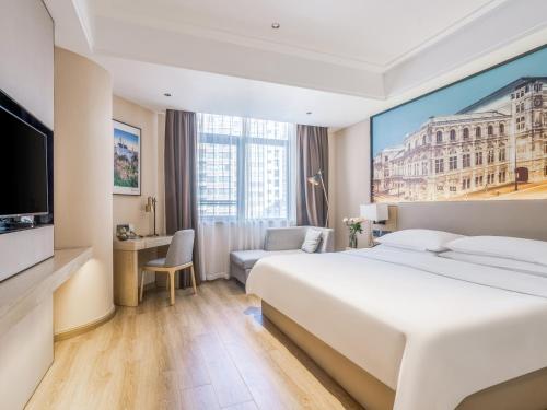 Imagen de la habitación del Hotel Country Inn & Suite by Radisson, Guiping Xishan. Foto 14