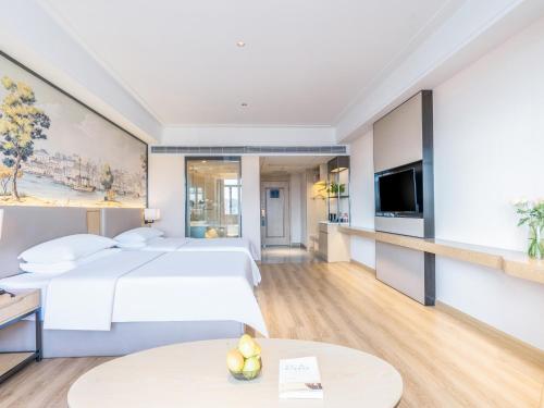 Imagen general del Hotel Country Inn & Suite by Radisson, Guiping Xishan. Foto 9