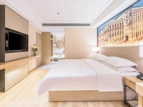 Imagen general del Hotel Country Inn & Suite by Radisson, Guiping Xishan. Foto 11