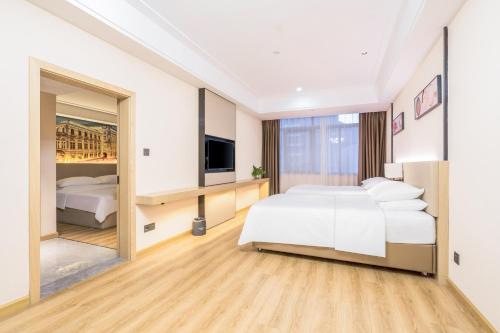 Imagen general del Hotel Country Inn & Suite by Radisson, Guiping Xishan. Foto 12