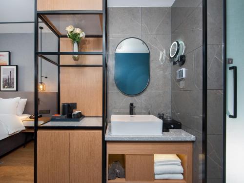 Imagen general del Hotel Country Inn & Suite by Radisson, Tianjin Wuqing Development Zone Wanda Plaza. Foto 3