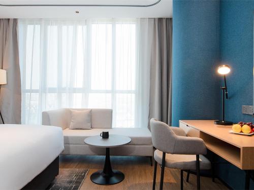 Imagen general del Hotel Country Inn & Suite by Radisson, Tianjin Wuqing Development Zone Wanda Plaza. Foto 6