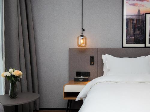 Imagen general del Hotel Country Inn & Suite by Radisson, Tianjin Wuqing Development Zone Wanda Plaza. Foto 8