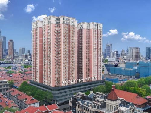 Imagen general del Hotel Country Inn & Suite by Radisson, Wuhan Hanjiang Road Jiqing Street. Foto 2