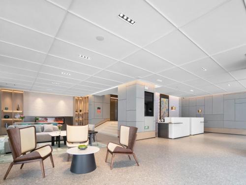 Imagen general del Hotel Country Inn & Suite by Radisson, Wuhan Hanjiang Road Jiqing Street. Foto 3