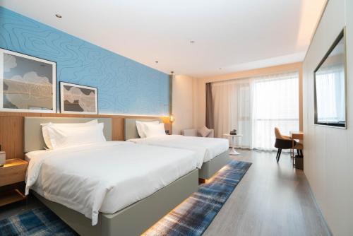 Imagen general del Hotel Country Inn & Suite by Radisson, Wuhan Optics Valley Technology Convention and Exhibition Center. Foto 4