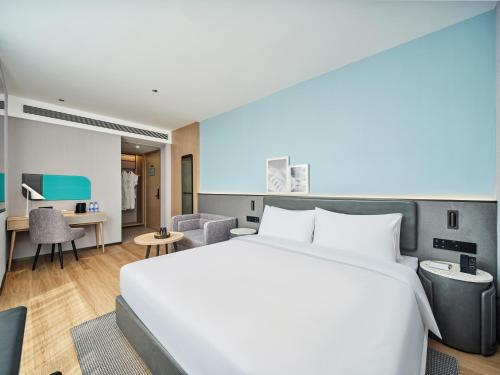 Imagen de la habitación del Hotel Country Inn & Suite by Radisson Xi\'an Bell Tower Ming City Wall. Foto 6