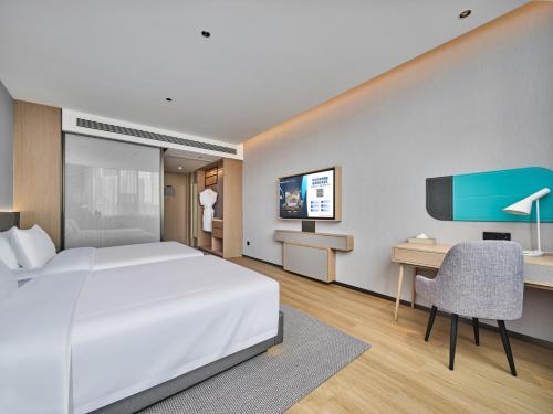 Imagen de la habitación del Hotel Country Inn & Suite by Radisson Xi\'an Bell Tower Ming City Wall. Foto 7