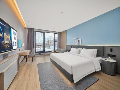 Imagen de la habitación del Hotel Country Inn & Suite by Radisson Xi\'an Bell Tower Ming City Wall. Foto 8