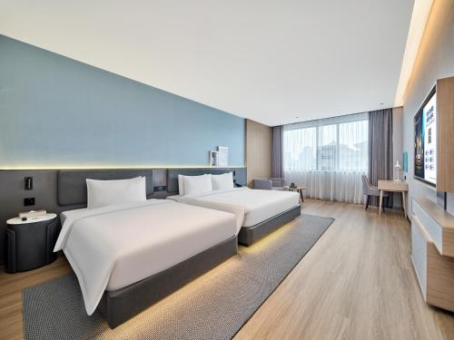Imagen de la habitación del Hotel Country Inn & Suite by Radisson Xi\'an Bell Tower Ming City Wall. Foto 11