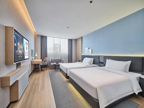 Imagen de la habitación del Hotel Country Inn & Suite by Radisson Xi\'an Bell Tower Ming City Wall. Foto 13