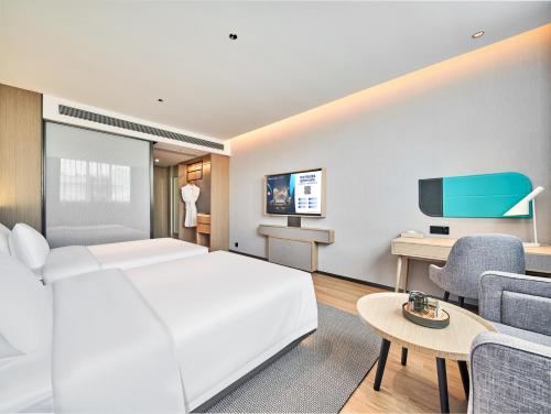 Imagen de la habitación del Hotel Country Inn & Suite by Radisson Xi\'an Bell Tower Ming City Wall. Foto 14