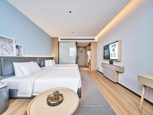 Imagen de la habitación del Hotel Country Inn & Suite by Radisson Xi\'an Bell Tower Ming City Wall. Foto 16